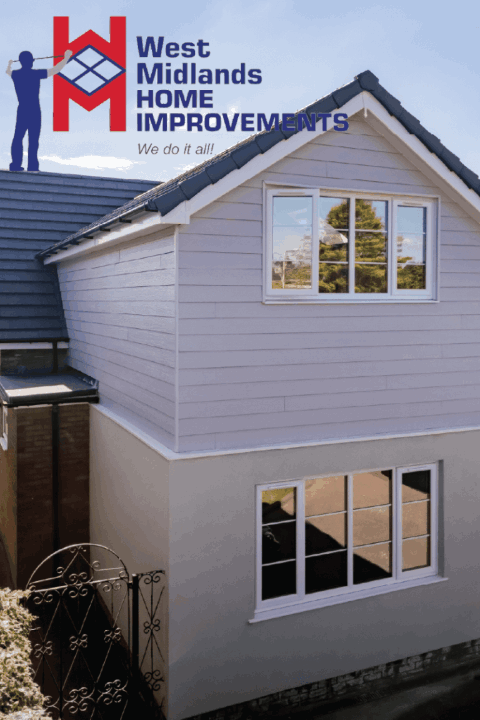 Close-up of a home’s gable extension with fresh cladding, modern roof tiles, and new double-glazed windows.