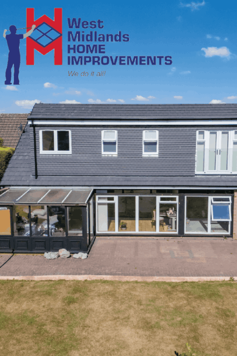 Rear view of a home with large sliding glass doors, modern windows, and a glazed conservatory extension.