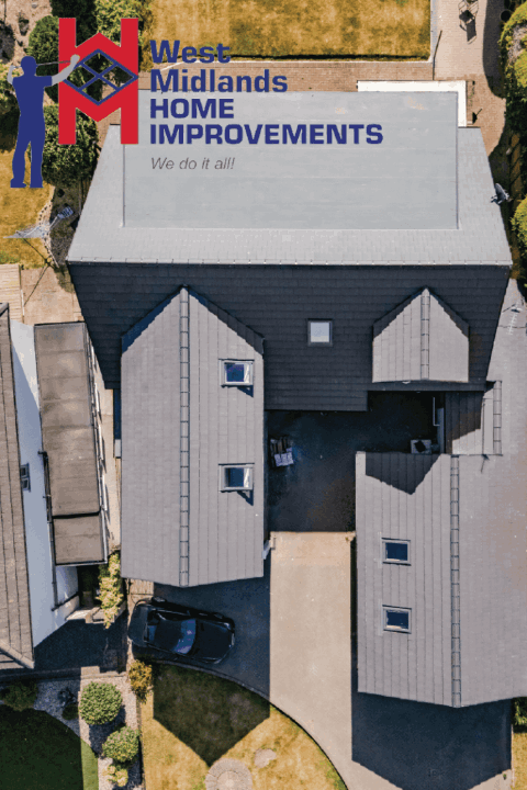 Overhead view of a modern home with new roofing, skylights, and a fresh driveway layout.