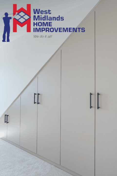 Custom-built sloped storage units under the eaves of a loft conversion in the West Midlands area. Maximizing space and functionality.