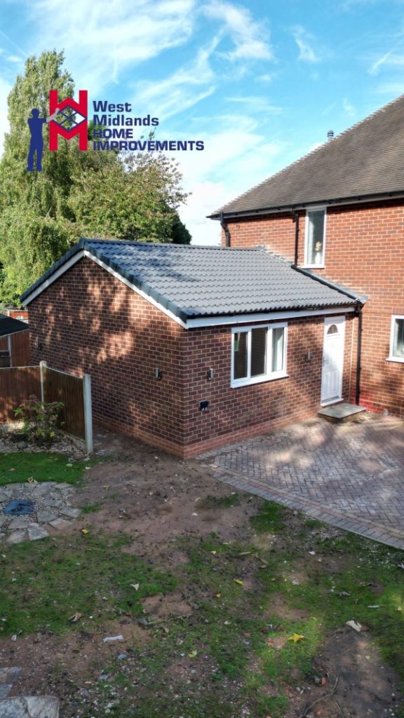 brick side extension with upvc window and white upvc door